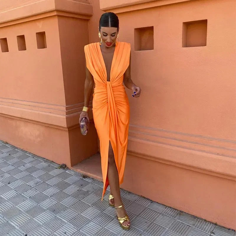 Elegant evening dress | Draped design and deep V-neckline | Chic and sophisticated