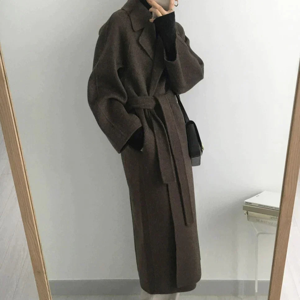 Warm, padded winter jacket for women with full length