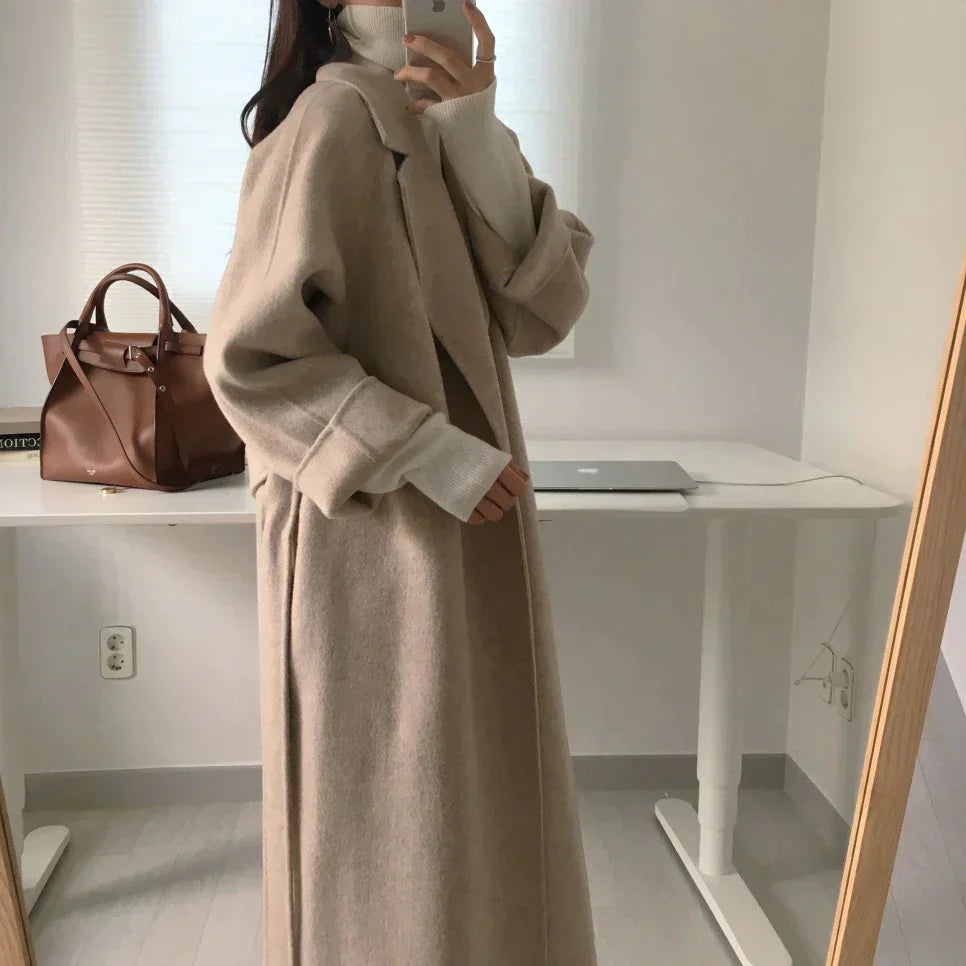 Warm, padded winter jacket for women with full length