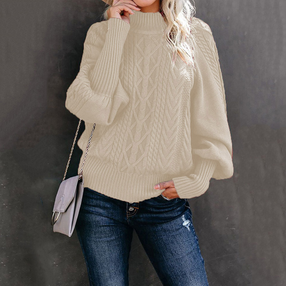 Women's chunky knit sweater with high collar and voluminous sleeves