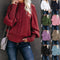 Women's chunky knit sweater with high collar and voluminous sleeves