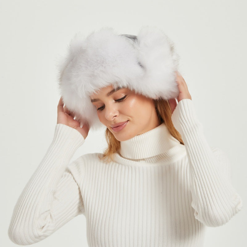 Women's fluffy winter hat with animal ears and voluminous design