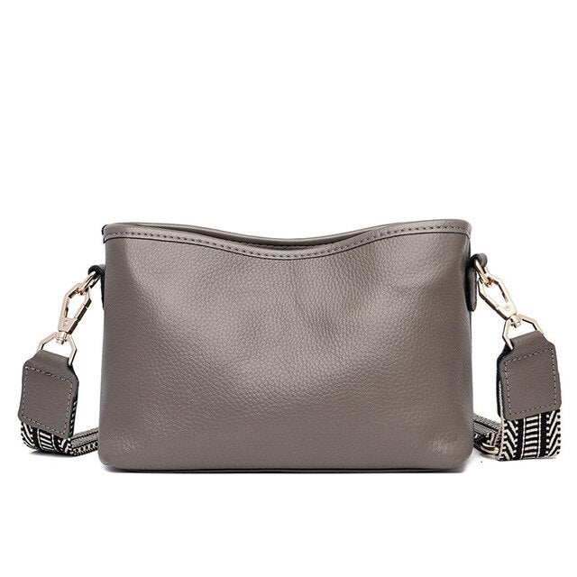 Small shoulder bag for women with wide guitar strap