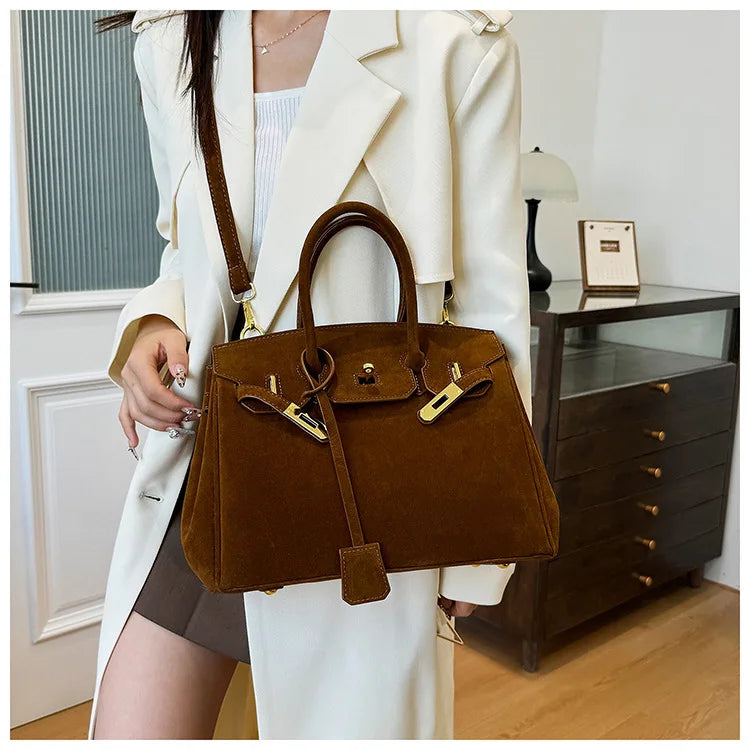 Kelly | Suede shoulder bag with gold hardware