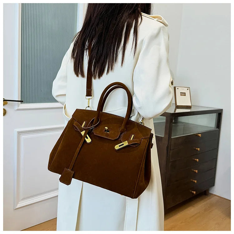 Kelly | Suede shoulder bag with gold hardware