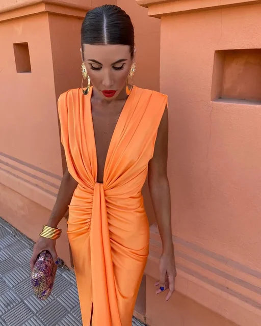 Elegant evening dress | Draped design and deep V-neckline | Chic and sophisticated