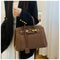 Kelly | Suede shoulder bag with gold hardware