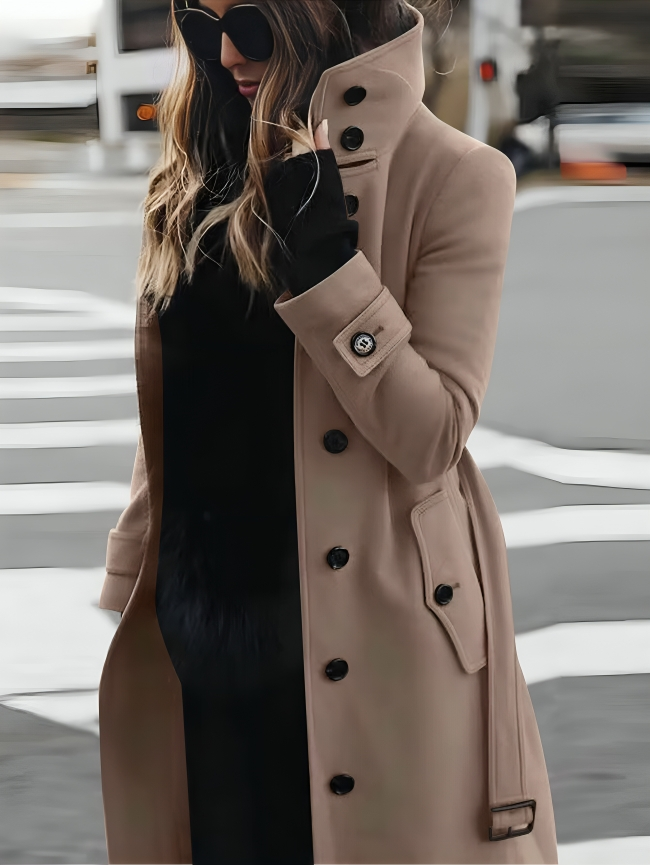 Abrigo largo elegante para mujer con cuello alto y cinturón de lazo elegante