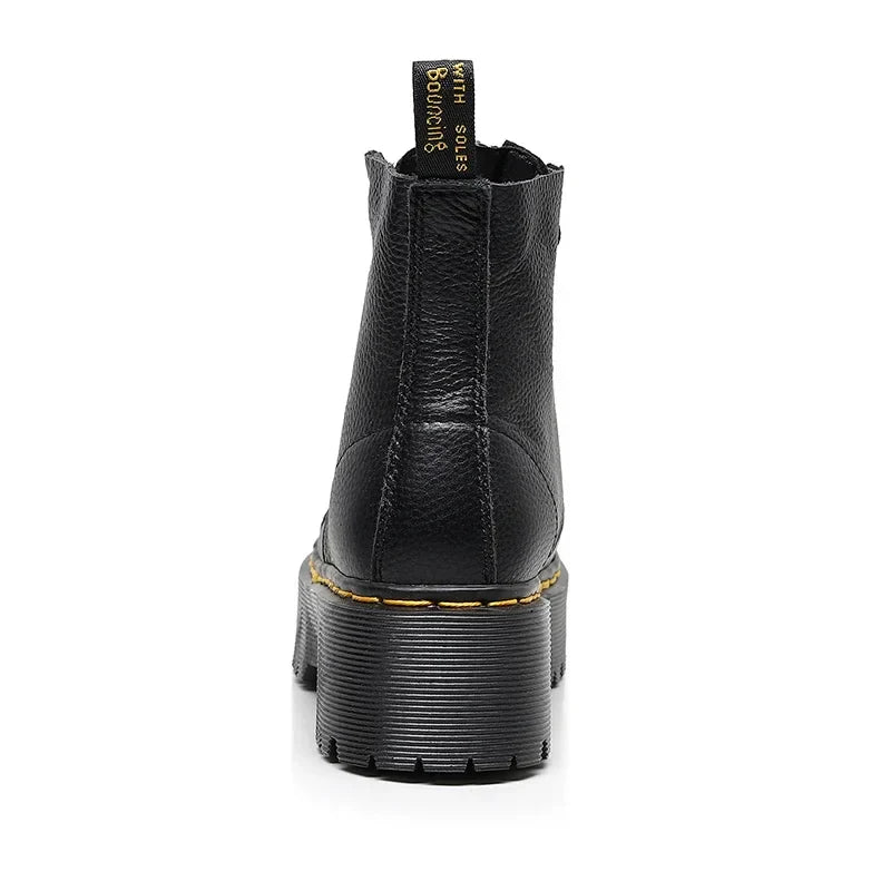 Women's leather boots with thick soles