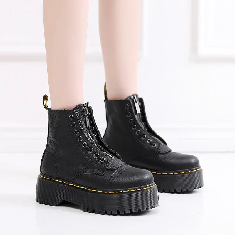 Women's leather boots with thick soles