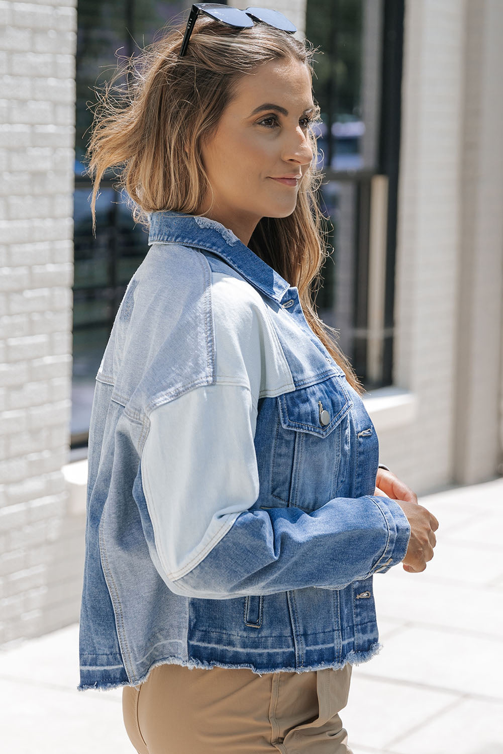 Stylish denim jacket with patchwork and frayed hem - Women