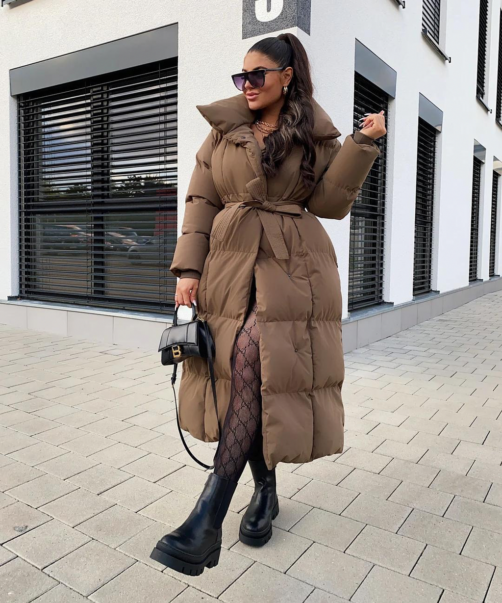 Жіноче довге елегантне пальто з поясом - вишуканий верхній одяг для жінок