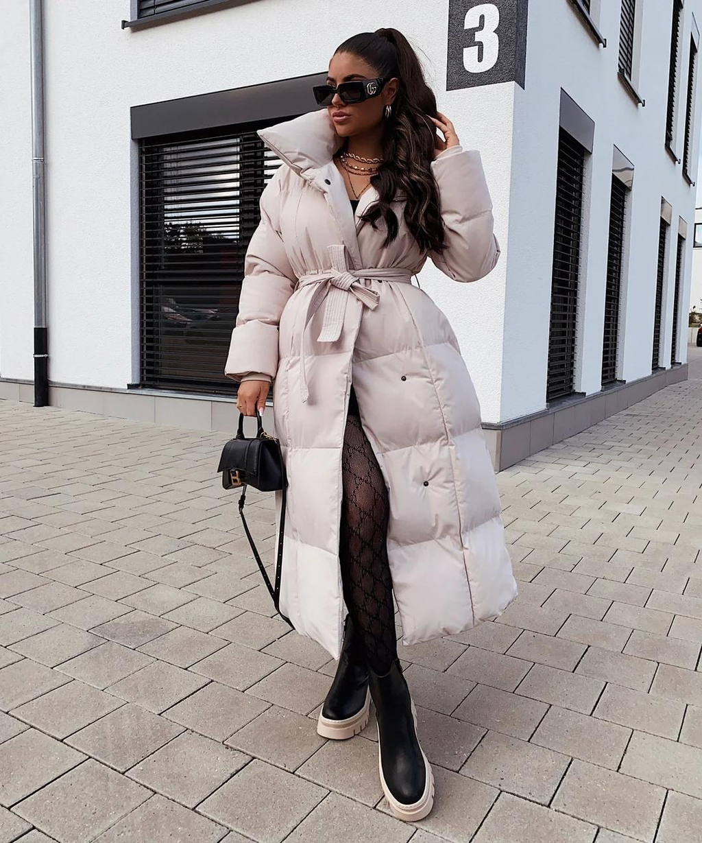 Жіноче довге елегантне пальто з поясом - вишуканий верхній одяг для жінок