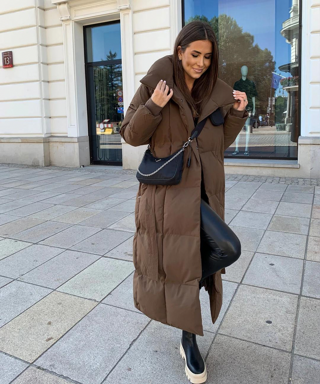 Жіноче довге елегантне пальто з поясом - вишуканий верхній одяг для жінок