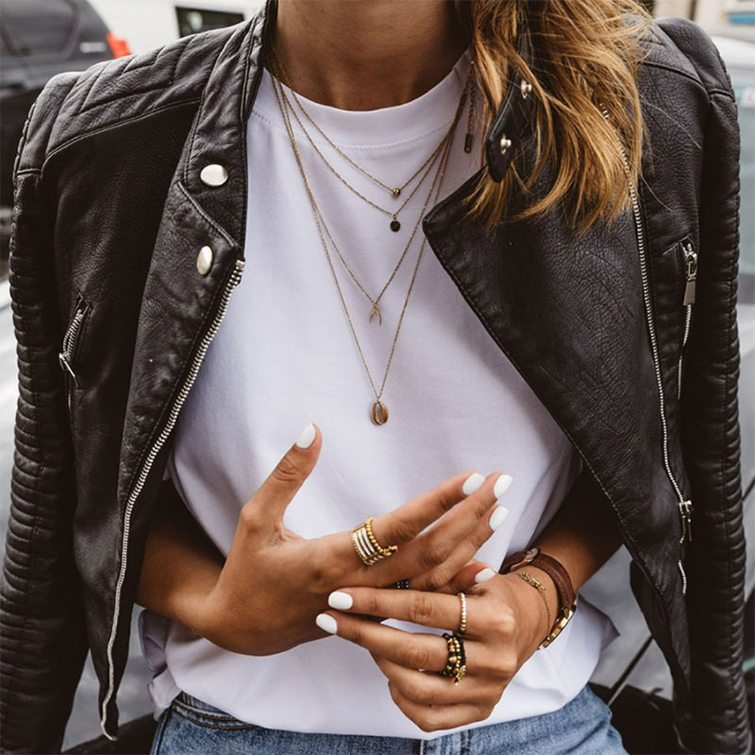 Fashionable PU leather jacket with a timeless design - Women