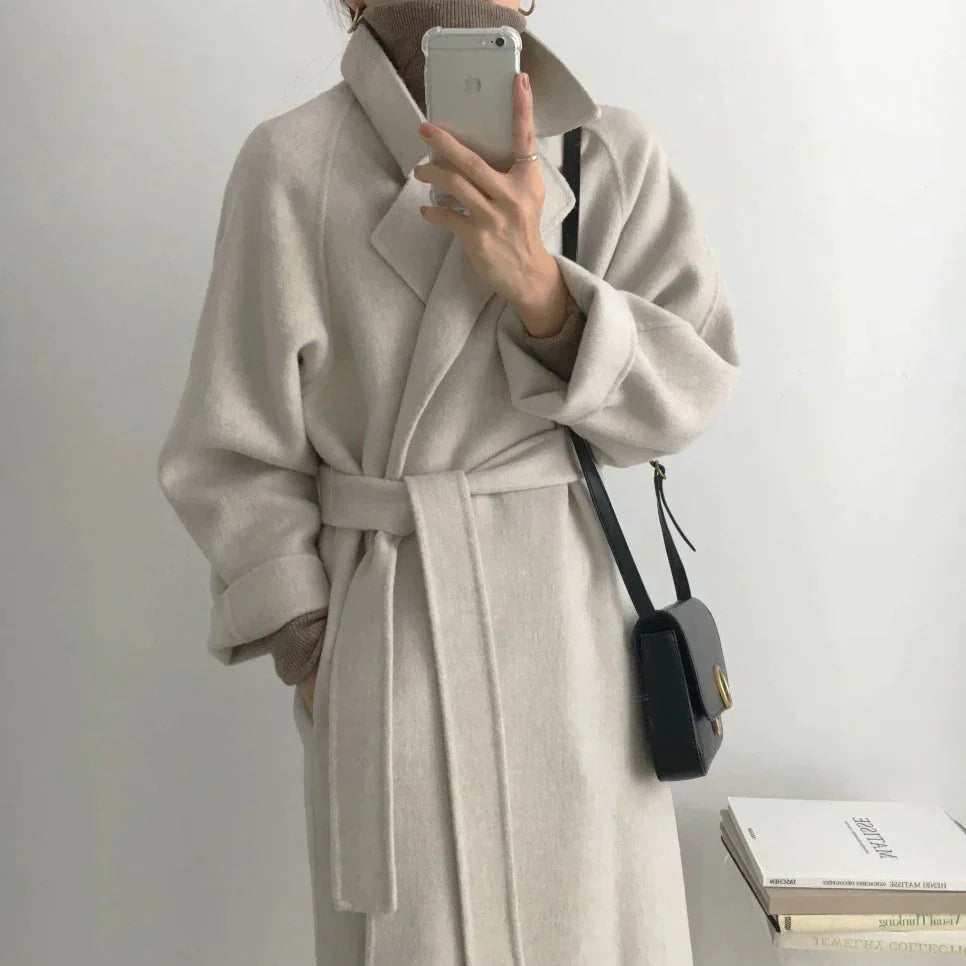 Warm, padded winter jacket for women with full length