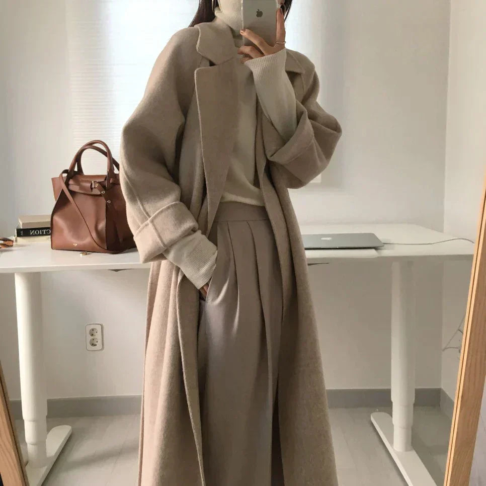 Warm, padded winter jacket for women with full length