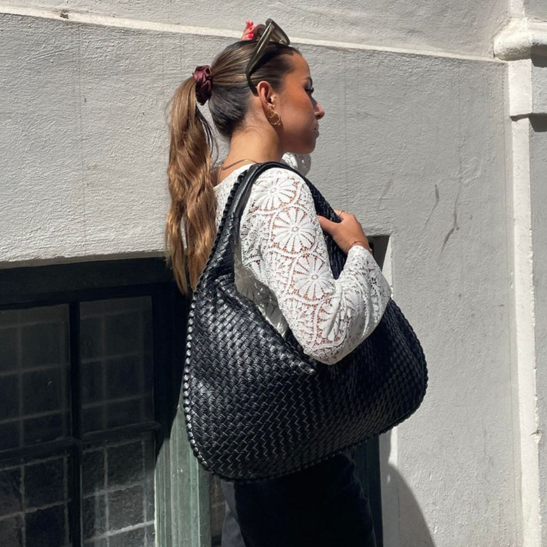 Women's structured hobo bag with adjustable shoulder strap
