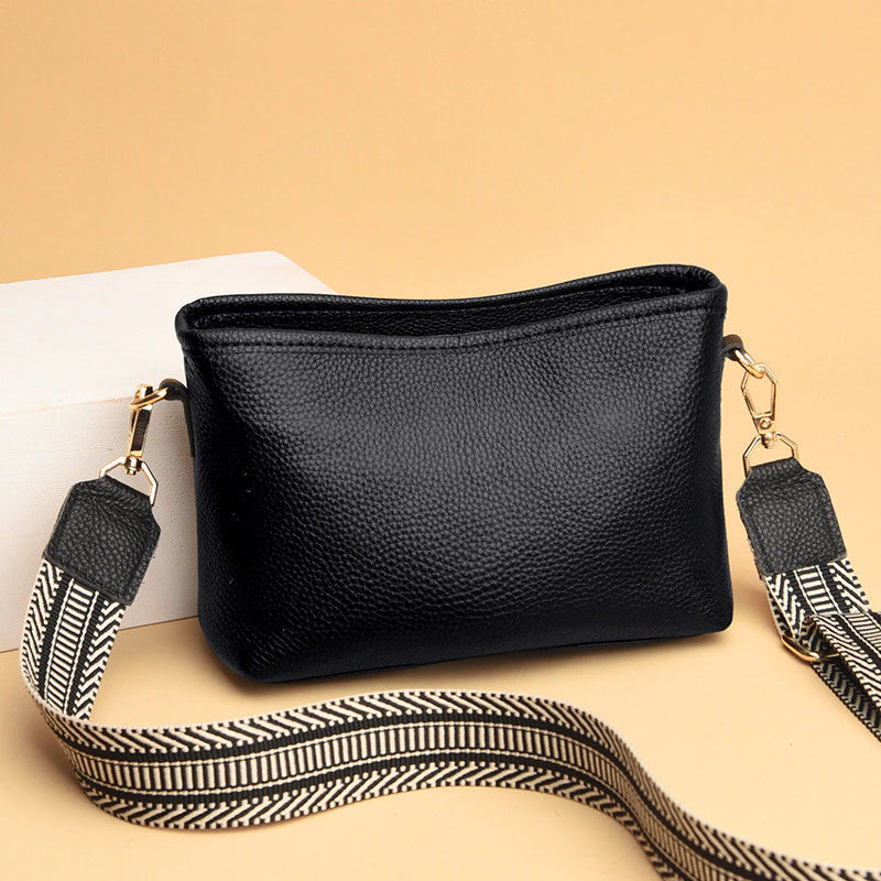 Small shoulder bag for women with wide guitar strap