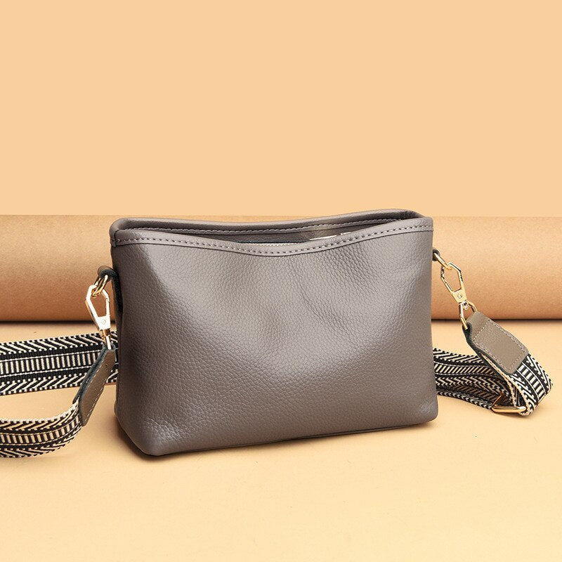 Small shoulder bag for women with wide guitar strap