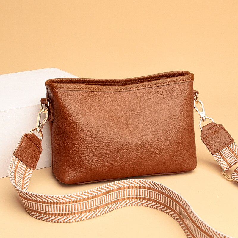 Small shoulder bag for women with wide guitar strap