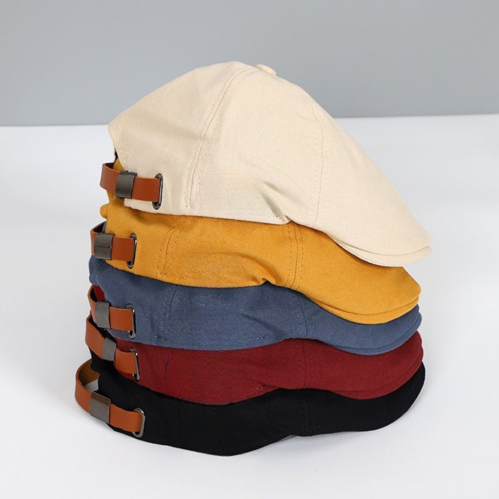 Unisex flat cap with curved flap and textured top