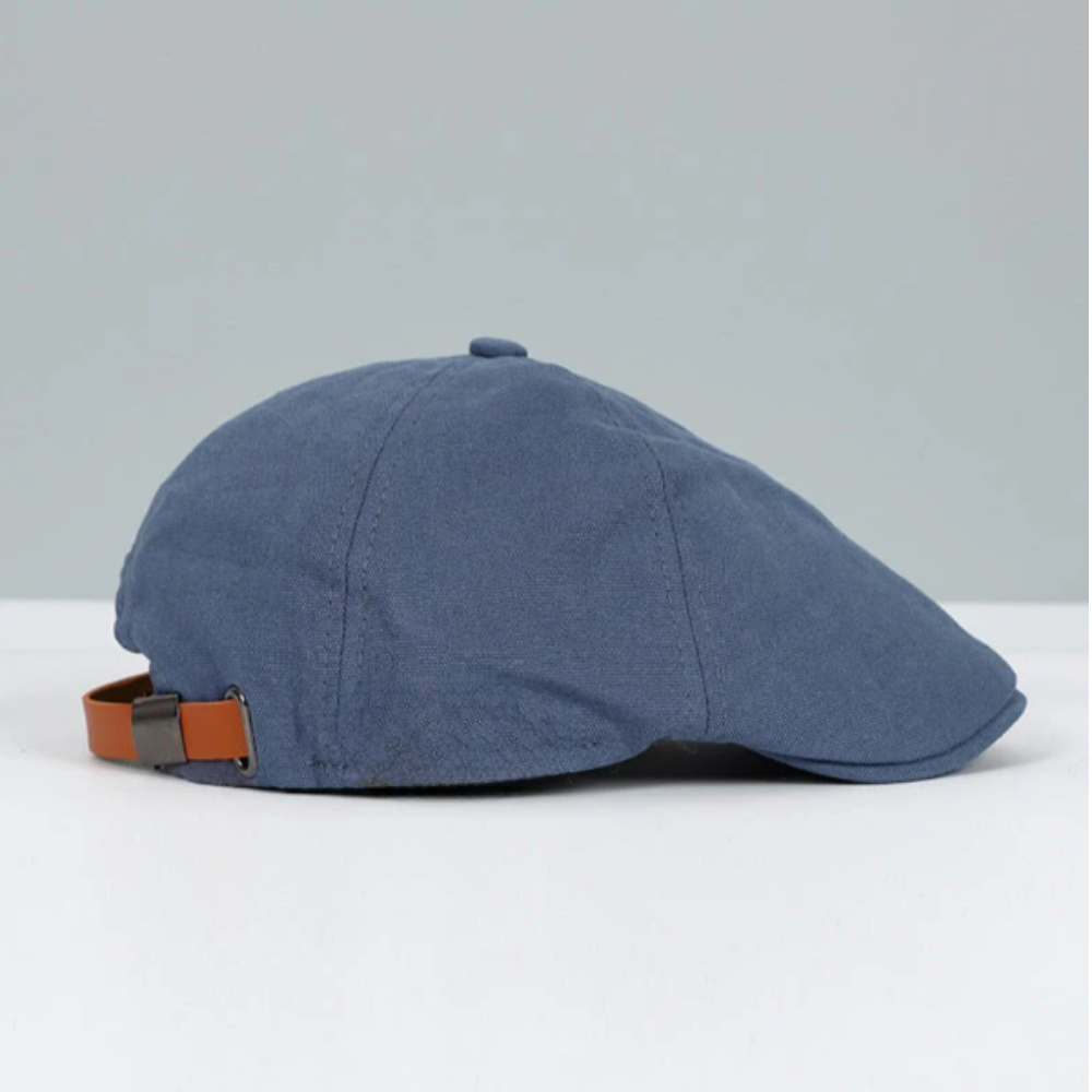 Unisex flat cap with curved flap and textured top