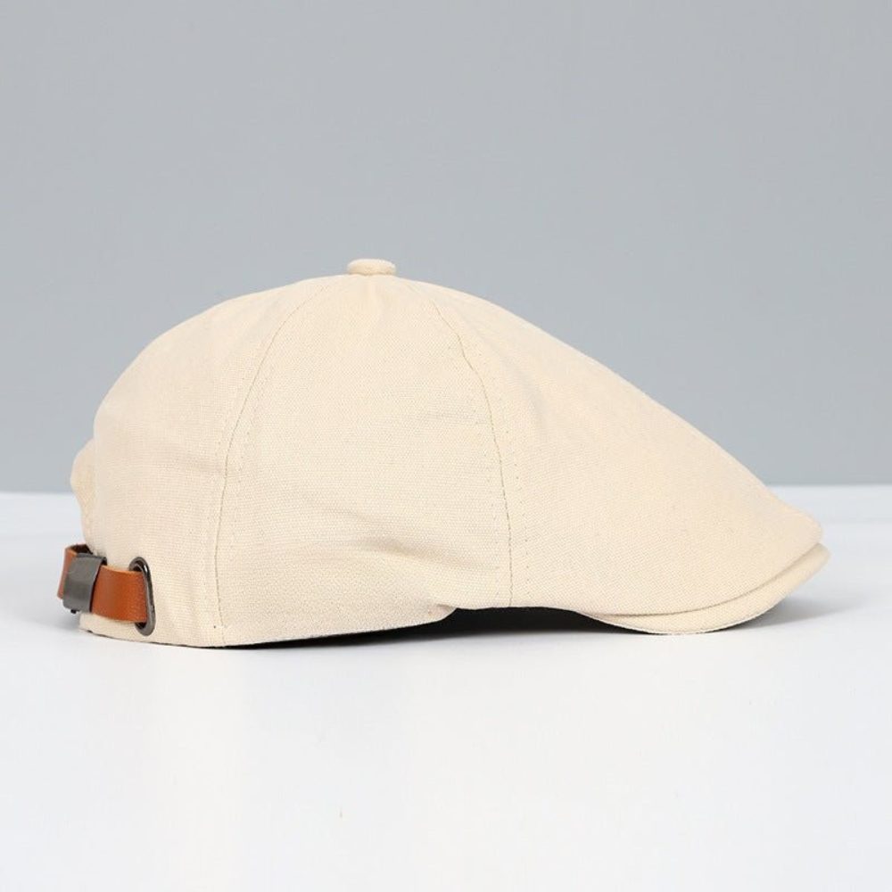 Unisex flat cap with curved flap and textured top