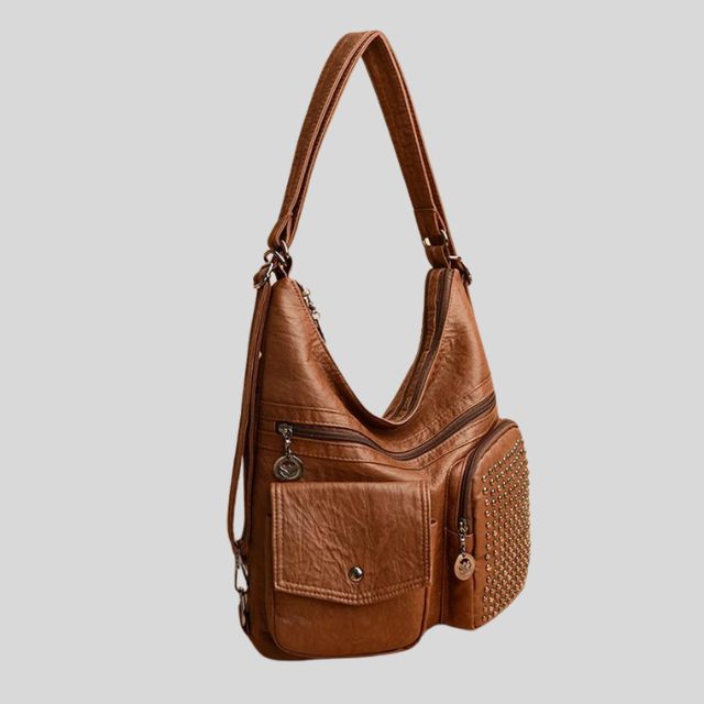 Vintpack - Studded leather backpack - Ideal for school and travel - Travel detail - Compact