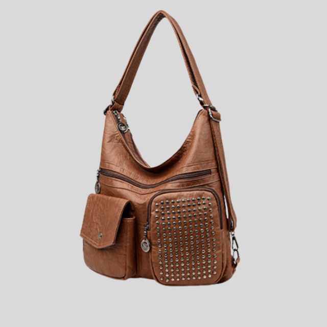 Vintpack - Studded leather backpack - Ideal for school and travel - Travel detail - Compact