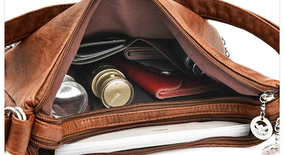 ODALIS - Leather handbag with multiple pockets